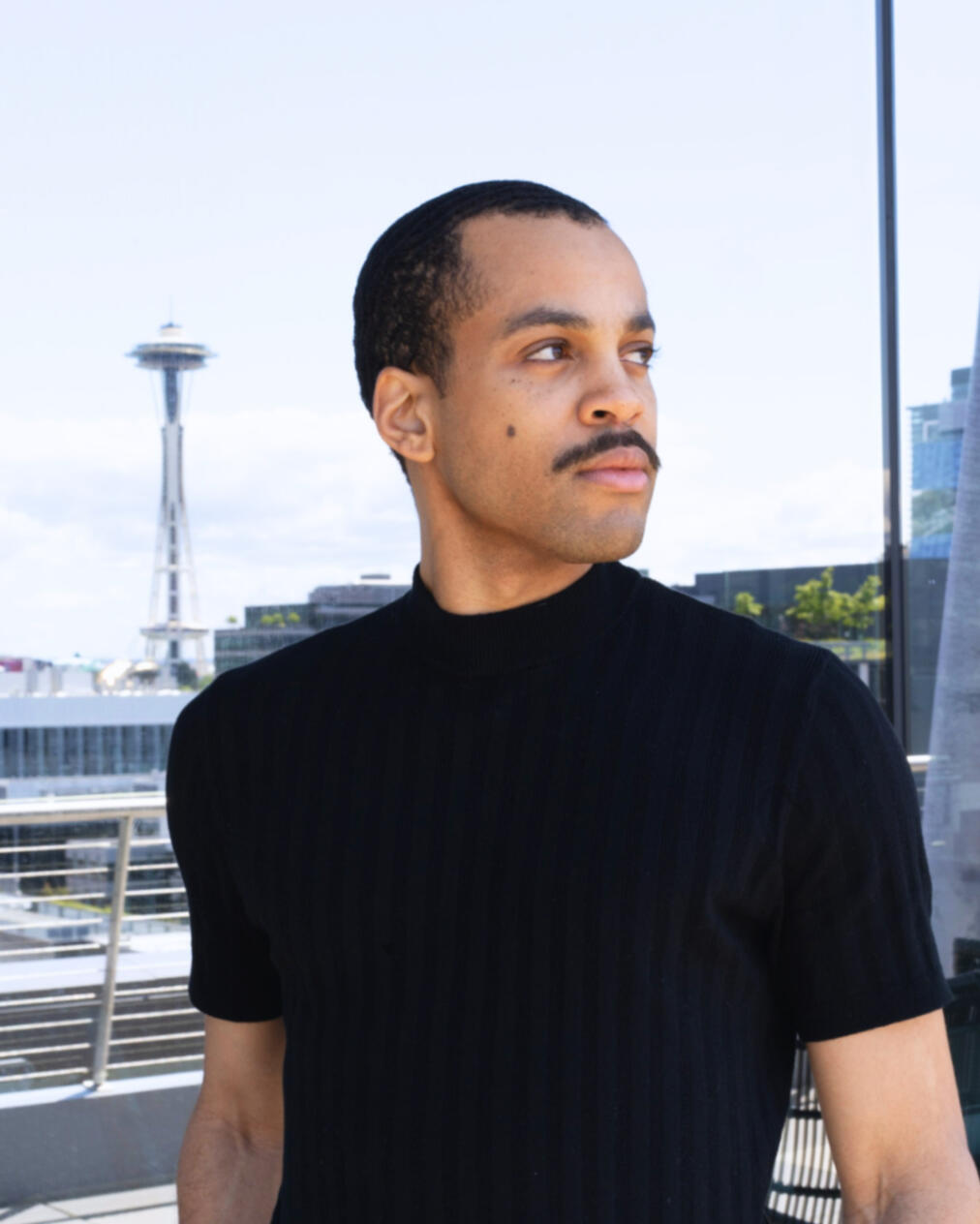 Bryan_Alston_Most_AI_Marketing_Operating_System_of_Tomorrow_Headshot_Outdoor_Space_Needle_Seattle_Black_Shirt